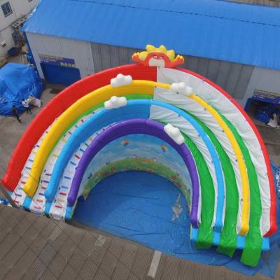 China Commercial Huge Inflatable Rainbow Slide For Mobile Water Pool Swim Park for sale