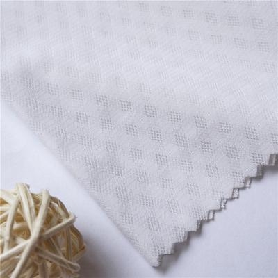 China Stretch Mesh Jacquard Fabric Stretch 0.1mm Diamond Shape Check Textiles Sportswear Lycra for sale