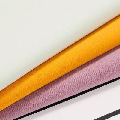 China QUICK DRY Double Sided Fabric Embossed Nylon Spandex Knitted Plain Stretch Fabric Factory Wholesale Price Dyed 100KG QUICK DRY for sale