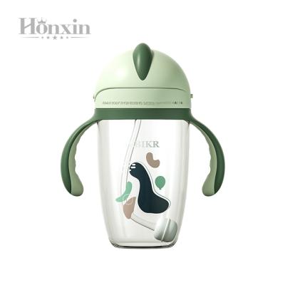 China Manufacturers Cheap BPA Free 300ml Baby Straw Cup Hands Free Bottle Baby Sippy Feeding Cup With Straw for sale