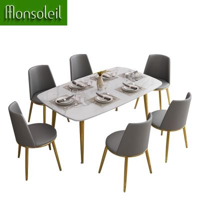 China Luxury Marble Dining Table Metal Dining Table and Chairs Set Furniture Upscale Marble Dining Table Set 6 Chairs for sale