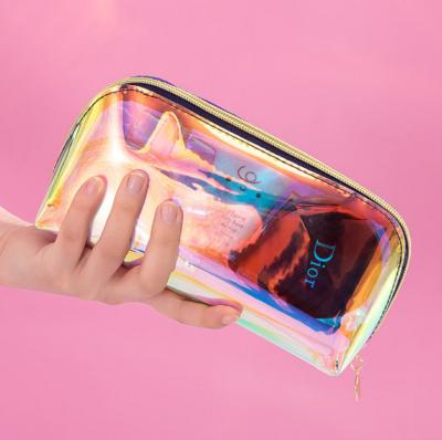 China Classic Promotional Transparent Style Travel Ladies Laser TPU Transparent Waterproof Cosmetic Bag, Factory Supply Makeup Bag for sale