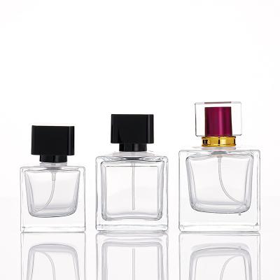 China Perfume Use 100ml 50ml 30ml Perfume Atomizer Bottle Wholesale High Quality Luxury Empty Square Perfume Bottle Glass Cube Perfume Bottle for sale