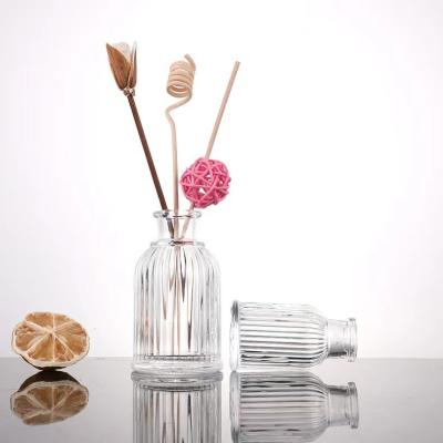 China Perfume use 50ml 100ml 200ml luxury clear empty aroma oil diffuser glass diffuser bottle with stick and cap for sale