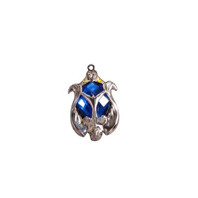 China Europe High Quality New Product 3D Pendant Badge Ornaments Embedded With Delicate Blue Gemstones For Gift Giving for sale