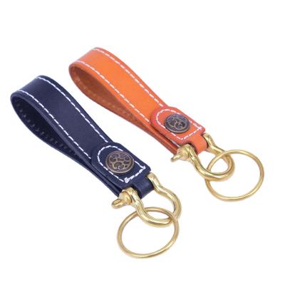 China High quality handmade leather main brass clogs buckle original personality retro leather key chain for sale