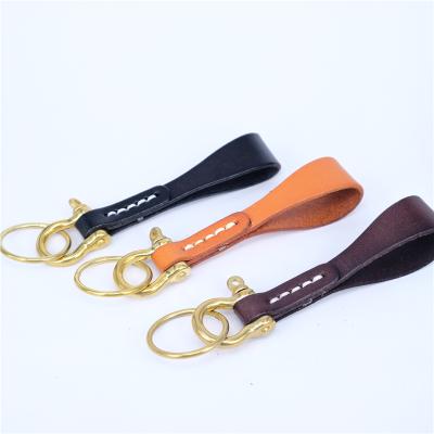 China Leather New Leather Brass Clogs Buckle Car Key Chain Retro Fashion Key Chain Handmade for sale