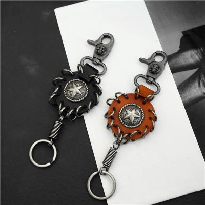 China Retro Leather Keychai Alloy Five Star Keychains Acute Cowhide Leather Handmade Creative Zinc Alloy Personality Car Key Chains Retro Keychains for sale