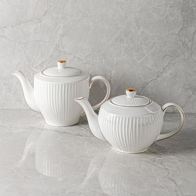 China WITH LID JiuJiuJu 1000ml Dinnerware Ceramic Teapots Nordic Style Vajjila White With Gold Rim Teapot For Wedding Decoration Pottery for sale