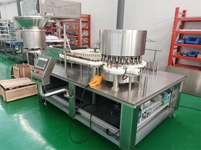 China Máquina automática de llenado y tapón para productos farmacéuticos líquidos y en polvo en venta