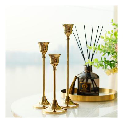 China Vintage Religious Rustic Wedding Candle Holder Activities Stick Brass Candlesticks Stands Gold Home Decorative Nordic Luxury Metal Other Candle Holder for sale