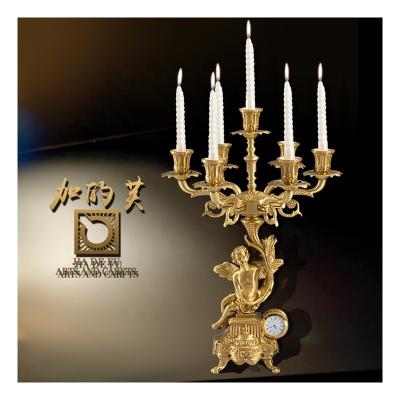 China Home Decoration Angel Decorative Candle Holder Luxury Continental Brass Candle Container for Family Party Dinner for sale