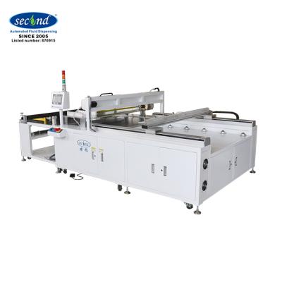 China Industrial Automatic RO Reverse Osmosis Membrane And Spacer Horzional Rolling And Dispensing Cutting Machine for sale