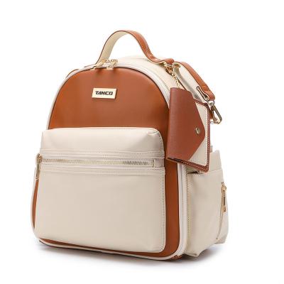 China Multifunctional Leather Baby Bottle Bag Multi-Function Portable Bag Mommy Shoulder Backpack Small Backpack Diaper Bag for sale