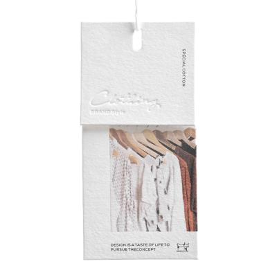 China Fashion White Paper Garment Tag Cotton Paper Viable Hot Selling Thick Simple Style Customized Luxury High Quality Label Fashion Garment Tag for sale