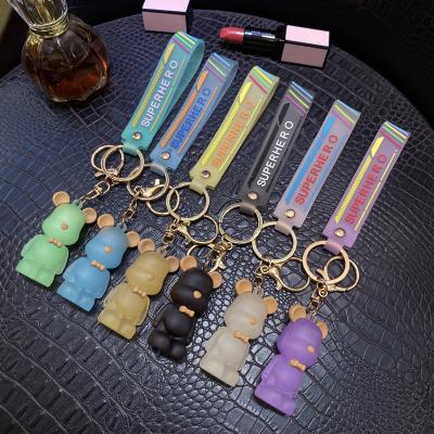 China Cute Fashionable Accessories Cute Resin Custom Resin Acrylic Cartoon Bear Power Bear Eurasian Brown Bear Key Chain Pendant for sale