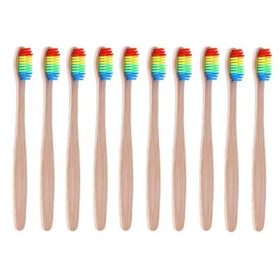 China 10PCS Rainbow Handle Wooden Toothbrush Bamboo Fiber Toothbrush Wooden Disposable Toothbrush Whitening Rainbow for sale