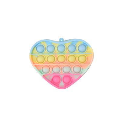 China New Reliever Extrusion Heart Shape Push Bubble Hand Finger Press Toy Rotating Squeeze Toys for sale