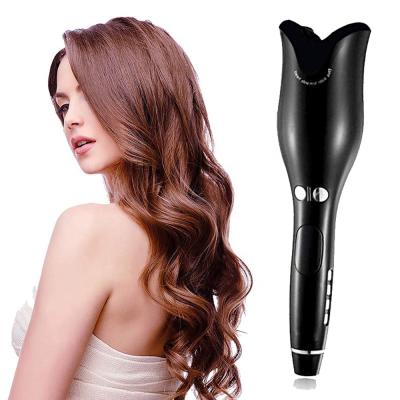 China 2022 Automatic Electric Cordless Tourmaline Hair Curler Automatic Rotating Curling Iron Hair Curlers Rod Roller New Curler for sale