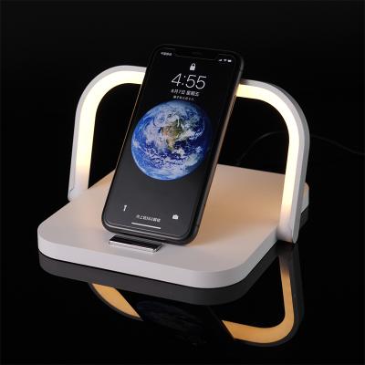 China Wireless Microphone Charger Mobile Phone Bracket Desk Lamp Three In One for sale