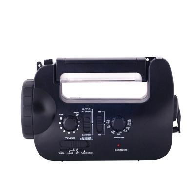 China Night Emergency Dynamo Radio LED Light Crank Charger with Flashing and Siren Mobile Phone Charger for sale