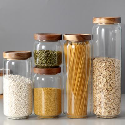 China Custom Food Heatable Storage High Borosilicate Decorate Fancy Glass Jars With Good Bamboo Lid Sealing for sale