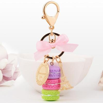 China Fashion Eco-friendly Bag Girl Pendant Car Ornament Cake Alloy Macaroon Bel Pendant Key Chain for sale