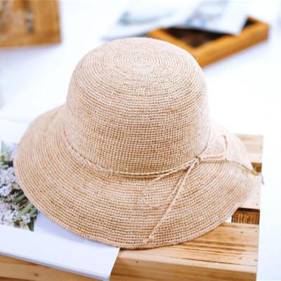 China Straw beach barred hats spring and summer new hand crochet for women hats solid color bucket hats for sale