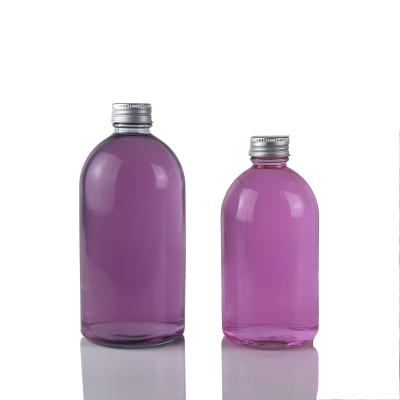 China Factory Direct Sales Wholesale Price Beverage Fruit Wine Advanced Glass Bottles Drink Honey Jar Wear Resistant Glass Bottle For Beverage Fruit Wine for sale