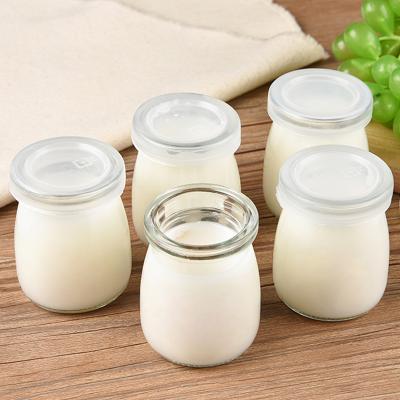 China 100ml Eco-friendly Recyclable Pudding Bottle High Quality Glass Bottle Can Be Customized Round Bottle Milk Bottle Candy Bottle for sale