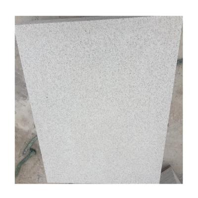 China Contemporary Pure White Granite Price From Bush Hammered Tiles And Slabs for sale