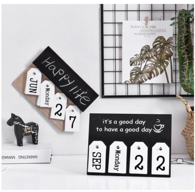 China Custom Table Calendar Printing Paper Desk Calendar 2021 Best Selling Flip Over Art Paper Printing Calendar for sale