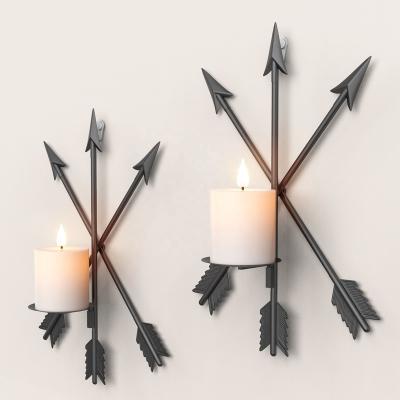 China Retro Novelty Modernism Style Elements Arrow-shape Design Black Iron Metal Wall Pillar Candle Holders Holders for sale