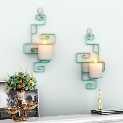 China Newest Novelty Pattern Geometric Fashion Design Iron Metal Wire Wall Pillar Candle Sconce Holders Light Green for sale