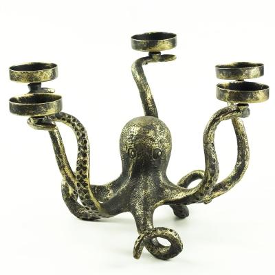 China Luxury Novelty Fashion Household Elegant Decor Cast Aluminum Octopus Tea Light Candlestick Candle Holders for sale