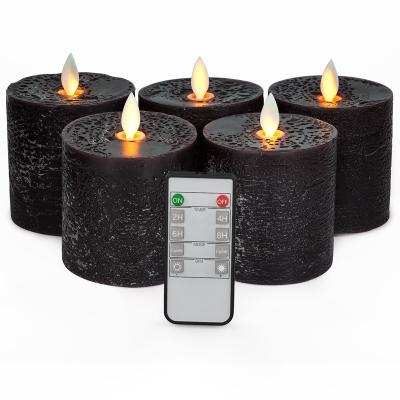 China Hot Sale Black Textured Stripe Finish Battery Operated Flameless Water Flameless Pillar Halloween Led Candles for sale