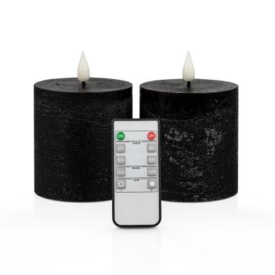 China Hot Selling Flameless Home Decoration Textured Black Led Flameless 3D Flickering Flame Pillar Halloween Candle for sale