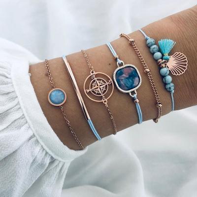 China BOHEMIA Boho Bracelets Set Hollow Compass Shell Bead Round Gem Chain Multilayer Leather Charm Bracelet For Women for sale