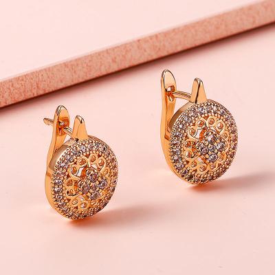 China Romantic Simple Geometric Metal Wedding Accessories Zircon Hollow Stud Earrings For Women for sale