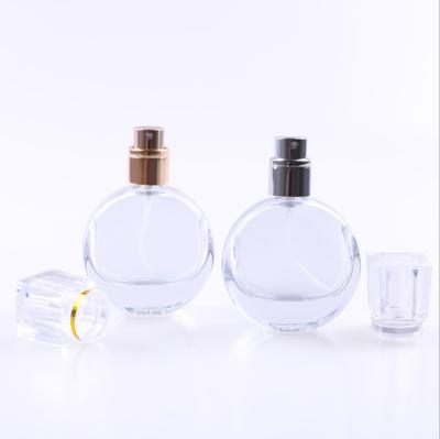 China 100ml Round Clear Flat Round Order-Friendly Perfume Bottle With Crimp Type Perfume Mist Sprayer Bottle for sale