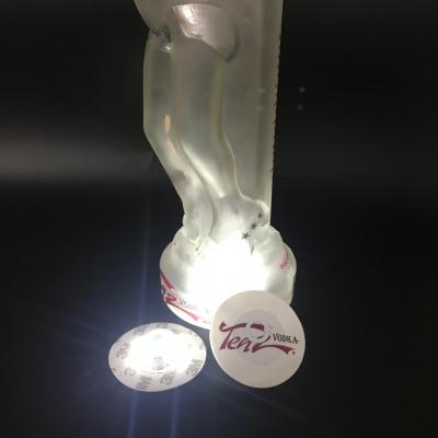 China Plastic etiqueta Montana Rusa glorifier of luz LED etiqueta Para botella LED for sale