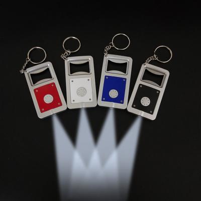 China Switch On Wholesales Customized Personal Opener Led Key Chain Beer Bottle Opener Key Ring For Bar for sale