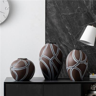 China Modern Interior Decorations Minimalist Handmade Art Vase Office Living Room Decor Ceramic Flower Vases For Home Decor for sale