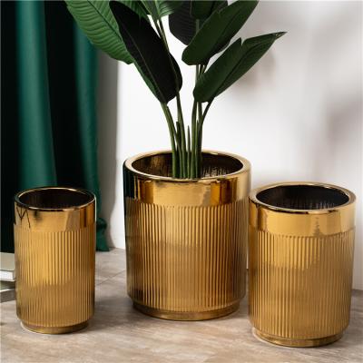 China Gold Minimalist Luxury Outdoor Cylinder Plant Home Hotel Home Floor Ceramic Flower Pots Large Large Ceramic Flower Pots For Plants for sale