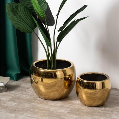 China Large Minimalist Creative Floor Decor Outdoor Garden Planter Round Luxury Gold Ceramic Flower Pots For Balcony for sale