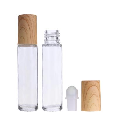 China New Wholesale 5ml 10ml 15ml Cosmetic Bamboo Roll On Roller Bottle Perfume Roller Glass Bottle With Bamboo Cap for sale