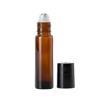 China Personal Care 10ml Brown Perfume Essential Oil In Glass Bottles And Metal Ball Bottles for sale