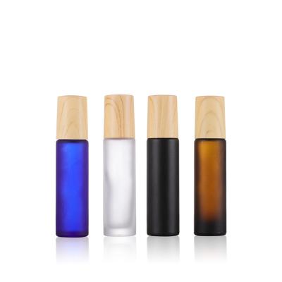 China Personal Care Hot Selling Mini Essential Oil Roller Bottle Round Luxury Empty Glass Roller Bottle 15ml for sale