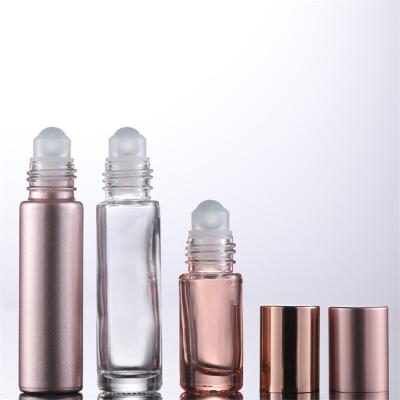 China Cosmetic Empty Essential Oil Roll Bottle Container 10ml Frost Clear Amber Glass Roll On Perfume Bottle for sale