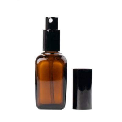 China Personal Care 50ml 100ml Square Glass Bottle Amber Glass Empty Cosmetic Bottle With Sprayer for sale